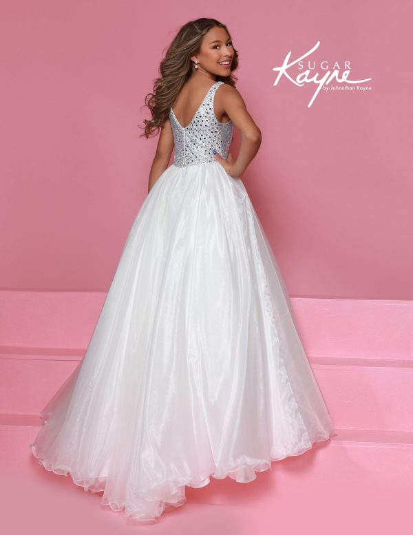 Back view of a white sparkle bodice girl's ball gown showcasing a low-v back and flowing skirt, made for pageant glamour.